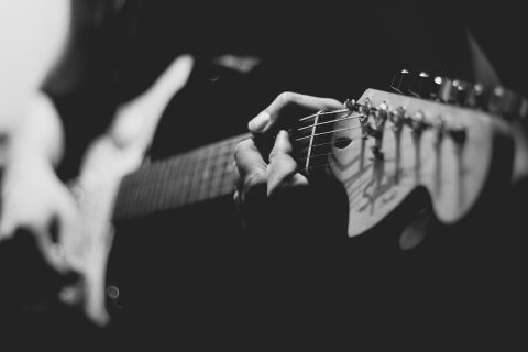 Playing on a Guitar