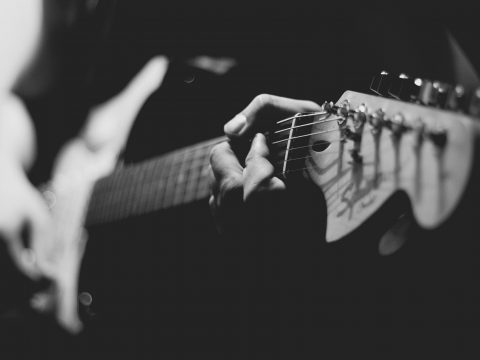Playing on a Guitar